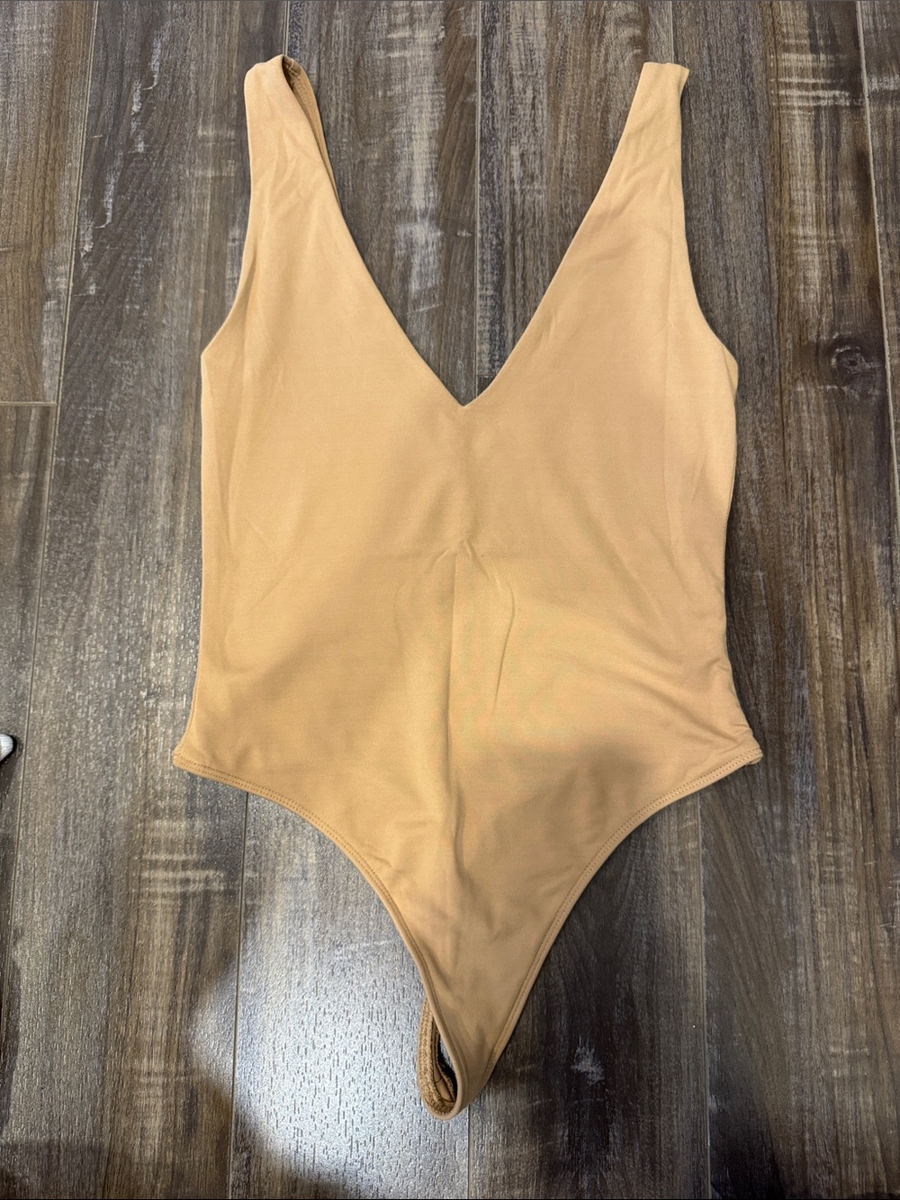 Babaton Black V-Neck One-Piece Bodysuit